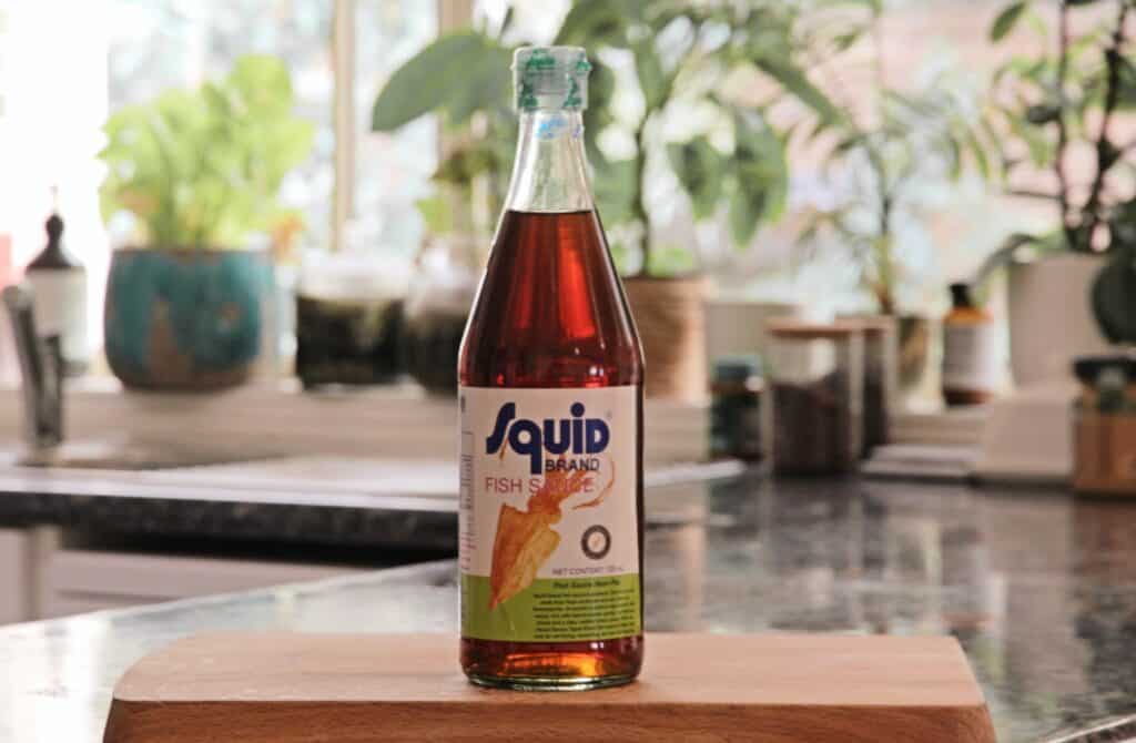 a bottle of fish sauce on top of a counter